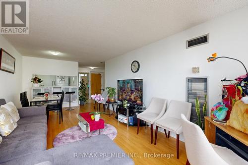 1218 - 3050 Ellesmere Road N, Toronto, ON - Indoor Photo Showing Living Room