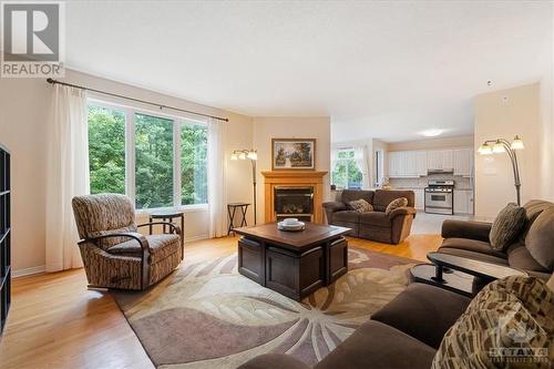 2121 Blue Willow Crescent, Ottawa, ON - Indoor Photo Showing Living Room With Fireplace