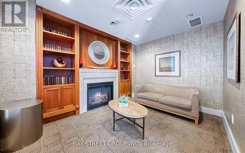 906 - 21 Hillcrest Avenue, Toronto (Willowdale East), ON - Indoor Photo Showing Living Room With Fireplace