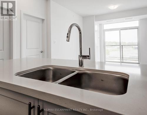 436 - 10 Mallard Trail E, Hamilton (Waterdown), ON - Indoor Photo Showing Kitchen With Double Sink