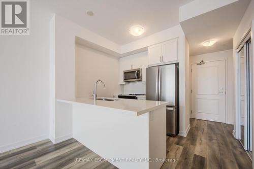 436 - 10 Mallard Trail E, Hamilton (Waterdown), ON - Indoor Photo Showing Kitchen With Stainless Steel Kitchen With Double Sink