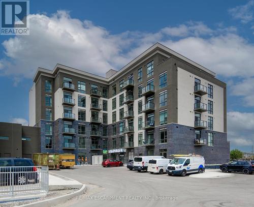 436 - 10 Mallard Trail E, Hamilton (Waterdown), ON - Outdoor With Balcony With Facade