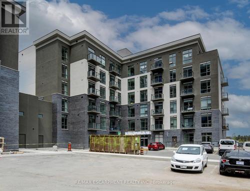 436 - 10 Mallard Trail E, Hamilton (Waterdown), ON - Outdoor With Balcony With Facade