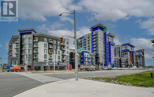 436 - 10 Mallard Trail E, Hamilton (Waterdown), ON - Outdoor With Facade