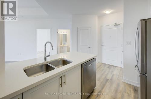 621 - 10 Mallard Trail, Hamilton (Waterdown), ON - Indoor Photo Showing Kitchen With Double Sink