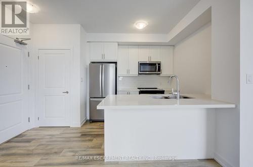 621 - 10 Mallard Trail, Hamilton (Waterdown), ON - Indoor Photo Showing Kitchen With Stainless Steel Kitchen With Double Sink