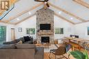 1140 Foxpoint Road, Bracebridge, ON  - Indoor Photo Showing Living Room With Fireplace 