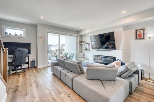 102-993 Antler Drive, Penticton, BC - Indoor Photo Showing Living Room With Fireplace