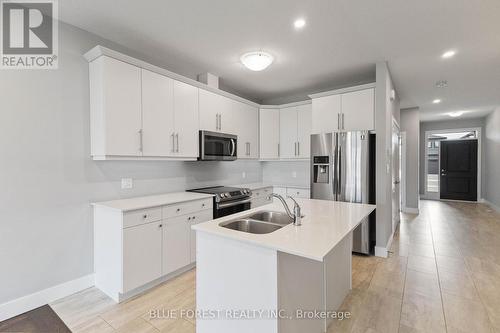 2232 Evans Boulevard, London, ON - Indoor Photo Showing Kitchen With Stainless Steel Kitchen With Double Sink With Upgraded Kitchen