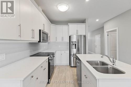 2232 Evans Boulevard, London, ON - Indoor Photo Showing Kitchen With Stainless Steel Kitchen With Double Sink