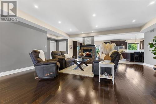 749 Chenaux Road, Haley Station, ON - Indoor Photo Showing Living Room With Fireplace