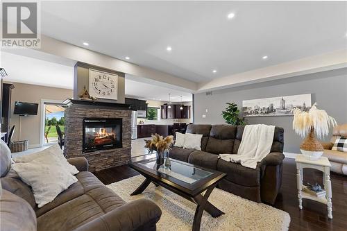 749 Chenaux Road, Haley Station, ON - Indoor Photo Showing Living Room With Fireplace