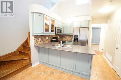 3 - 714 Neighbourhood Circle, Mississauga, ON - Indoor Photo Showing Kitchen With Double Sink