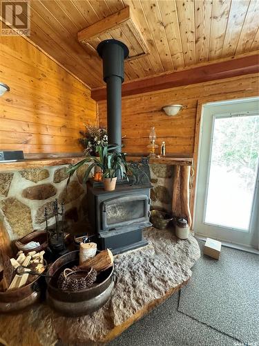 36 1St Street E, Weekes, SK - Indoor With Fireplace