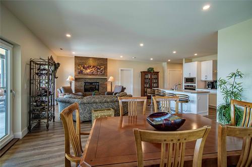 331-300 Vista Park, Penticton, BC - Indoor Photo Showing Dining Room With Fireplace