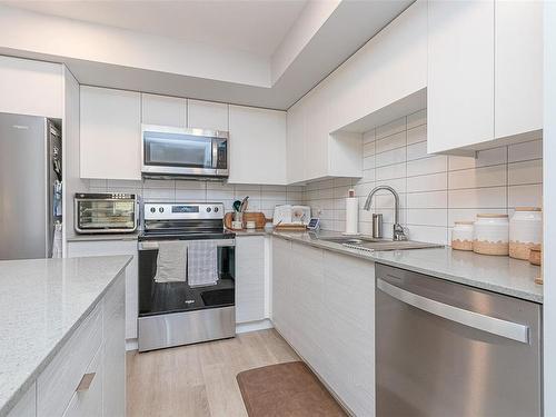 202-4810 Cedar Ridge Pl, Nanaimo, BC - Indoor Photo Showing Kitchen With Stainless Steel Kitchen With Upgraded Kitchen