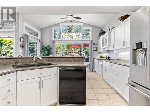 3945 Gallaghers Circle, Kelowna, BC - Indoor Photo Showing Kitchen With Double Sink