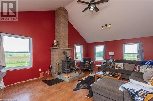 2264 Chiswick Line, Powassan, ON - Indoor Photo Showing Living Room With Fireplace