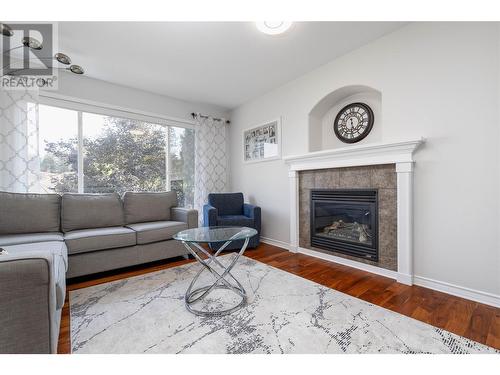 3090 Quail Run Drive, Kelowna, BC - Indoor Photo Showing Living Room With Fireplace