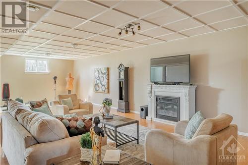 1135 Caprice Court, Ottawa, ON - Indoor Photo Showing Living Room With Fireplace