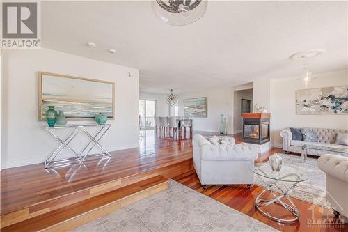 1135 Caprice Court, Ottawa, ON - Indoor Photo Showing Living Room With Fireplace