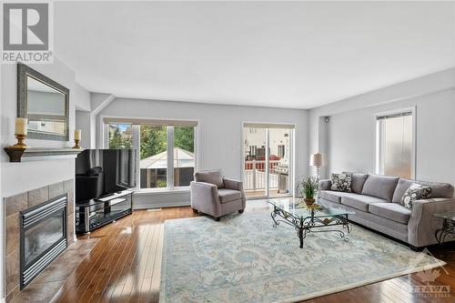 235 Parkrose Private, Ottawa, ON - Indoor Photo Showing Living Room With Fireplace