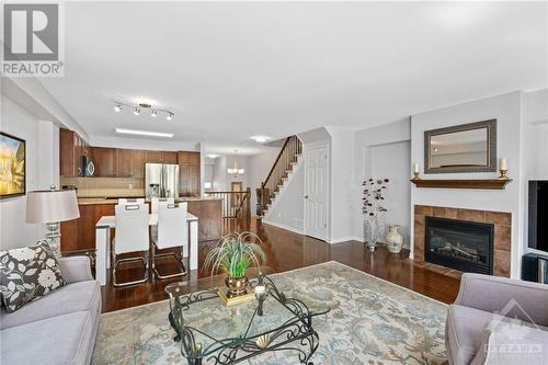 235 Parkrose Private, Ottawa, ON - Indoor Photo Showing Living Room With Fireplace