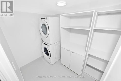 706 - 10 Eva Road, Toronto (Etobicoke West Mall), ON - Indoor Photo Showing Laundry Room