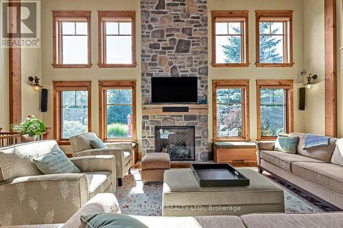 136 Snowbridge Way, Blue Mountains (Blue Mountain Resort Area), ON - Indoor Photo Showing Living Room With Fireplace