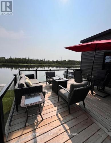 W5-657 Thunder Bridge Road, Kawartha Lakes, ON - Outdoor With Deck Patio Veranda