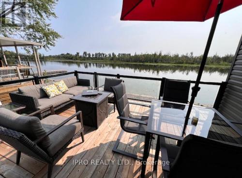 W5-657 Thunder Bridge Road, Kawartha Lakes, ON - Outdoor With Body Of Water With Deck Patio Veranda