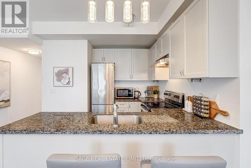 314 - 1711 Pure Springs Boulevard, Pickering (Duffin Heights), ON - Indoor Photo Showing Kitchen With Upgraded Kitchen