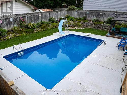 260 Ferncrest Road, Woodstock, ON - Outdoor With In Ground Pool With Backyard