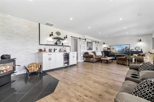 11158 Dakota Road, Lake Country, BC - Indoor Photo Showing Living Room With Fireplace