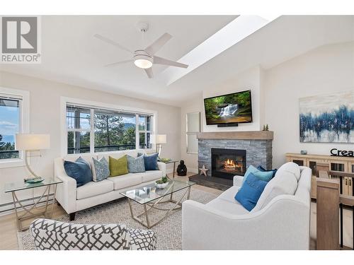 2025 Huckleberry Road, Kelowna, BC - Indoor Photo Showing Living Room With Fireplace