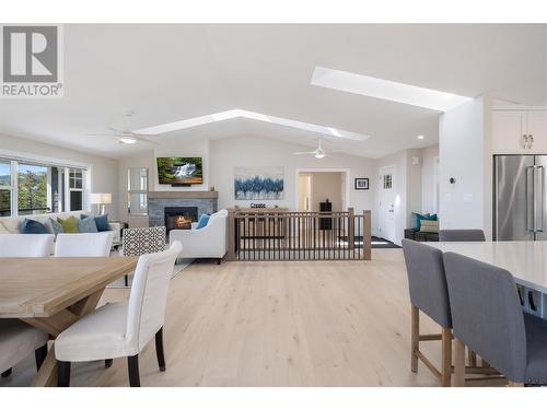 2025 Huckleberry Road, Kelowna, BC - Indoor Photo Showing Dining Room With Fireplace