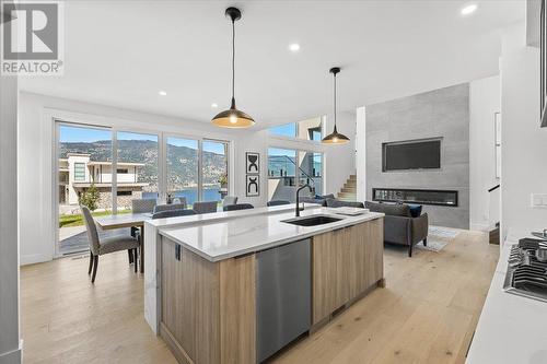 520 Clifton Lane, Kelowna, BC - Indoor Photo Showing Kitchen With Fireplace With Double Sink With Upgraded Kitchen