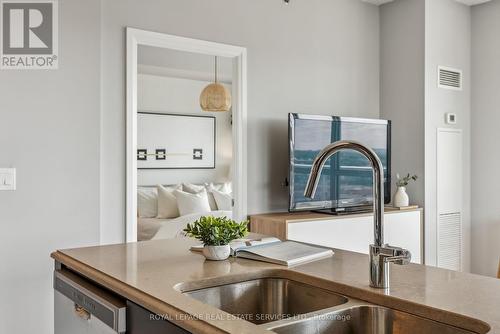 1411 - 65 Speers Road, Oakville (Old Oakville), ON - Indoor Photo Showing Kitchen With Double Sink