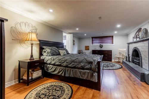 299 Carson Drive, Hamilton, ON - Indoor Photo Showing Bedroom With Fireplace