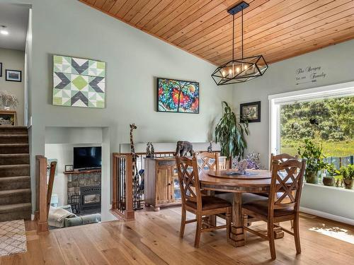 736 Durango Drive, Kamloops, BC - Indoor Photo Showing Dining Room With Fireplace