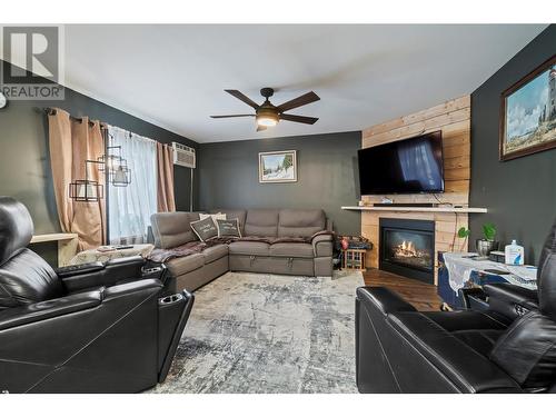 3402 24A Avenue, Vernon, BC - Indoor Photo Showing Living Room With Fireplace