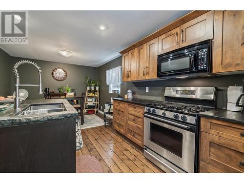 3402 24A Avenue, Vernon, BC - Indoor Photo Showing Kitchen With Double Sink