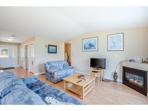 111 - 4200 Grandview Drive, Castlegar, BC - Indoor Photo Showing Living Room With Fireplace