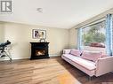 1472 99Th Street, North Battleford, SK  - Indoor Photo Showing Living Room With Fireplace 