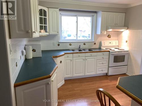 Upper - 147 Bonham Blvd Boulevard, Mississauga (Streetsville), ON - Indoor Photo Showing Kitchen With Double Sink