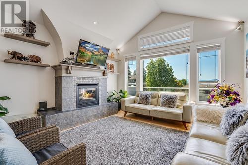 5035 Seon Crescent, Kelowna, BC - Indoor Photo Showing Living Room With Fireplace