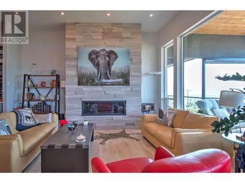 6640 Blackcomb Way, Vernon, BC - Indoor Photo Showing Living Room With Fireplace