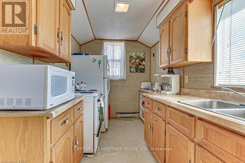 Imported from itso - 137 Bessie Street, Central Elgin (Port Stanley), ON - Indoor Photo Showing Kitchen With Double Sink