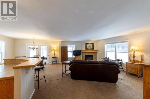 558 Anderson  Road, Golden, BC - Indoor Photo Showing Living Room With Fireplace