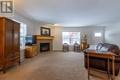 558 Anderson  Road, Golden, BC - Indoor Photo Showing Living Room With Fireplace